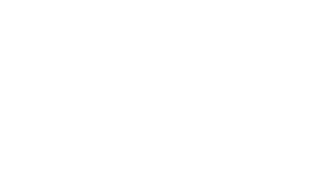 A man is riding a Briggs Electric bike on a hill, experiencing the quality electrical services.